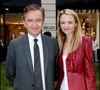 Le père de cinq enfants – issus de deux mariages, Delphine, Antoine, Alexandre, Frédéric et Jean – a ainsi livré sa règle des 20-80, clé de la réussite. 

Bernard Arnault et sa fille Delphine Arnault, dans la boutique Kenzo à Paris